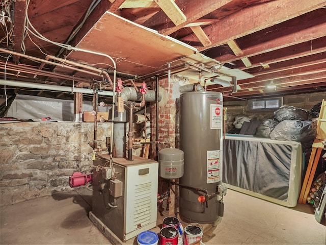 utility room featuring a heating unit and water heater