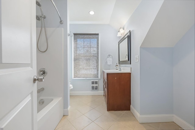 full bathroom with tile patterned flooring, vanity, tub / shower combination, and toilet