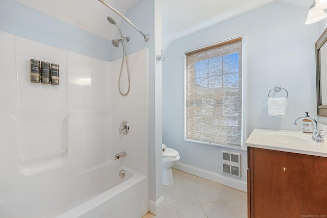 full bathroom featuring tile patterned flooring, vanity,  shower combination, and toilet