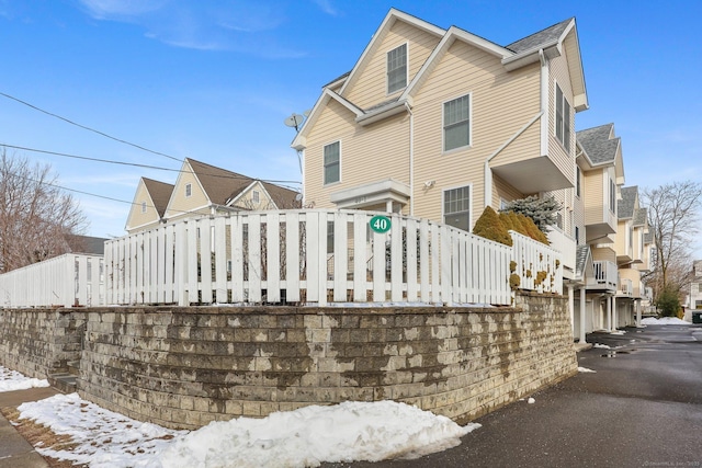 view of snow covered house