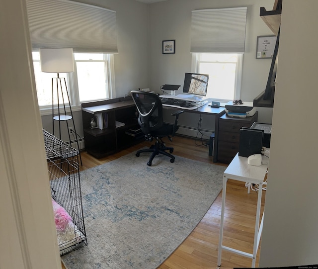 office area with wood finished floors