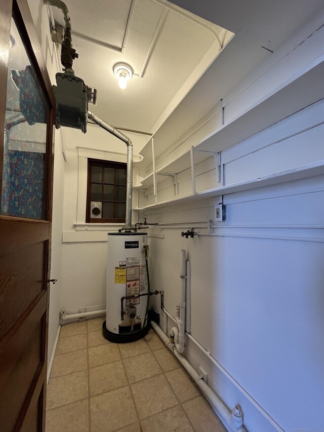 utility room with water heater