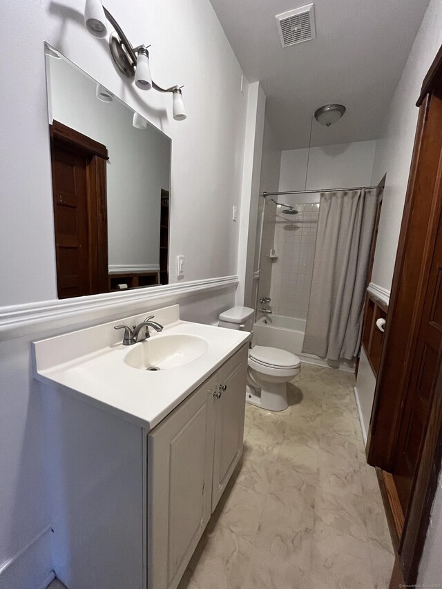 full bathroom featuring shower / bath combination with curtain, vanity, and toilet