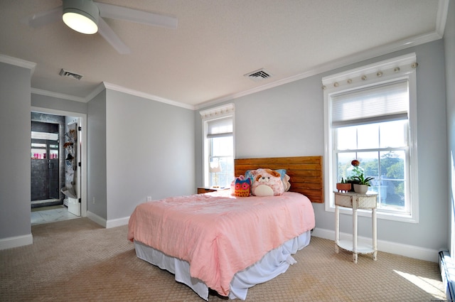 carpeted bedroom featuring baseboards, multiple windows, and visible vents