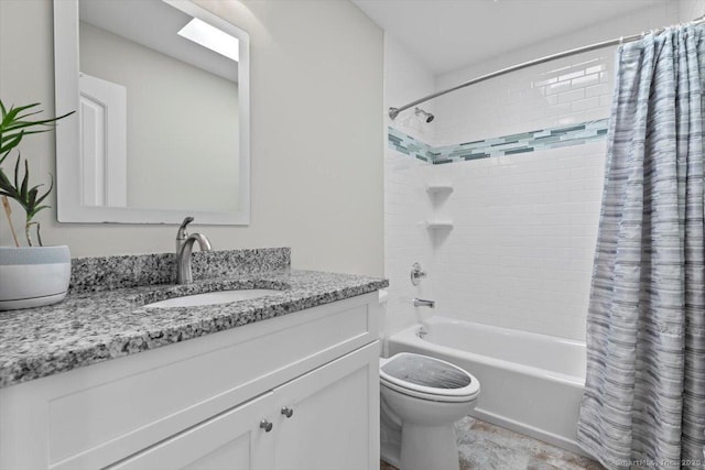 full bathroom with shower / bath combo, vanity, and toilet