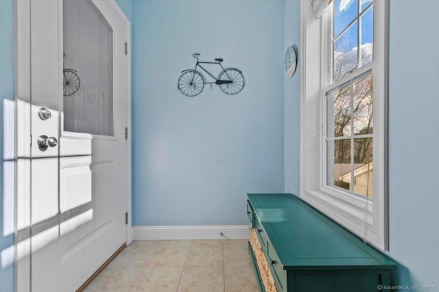 mudroom with light tile patterned floors