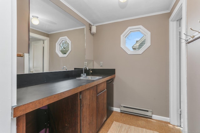 interior space with a healthy amount of sunlight, a baseboard heating unit, a sink, and ornamental molding