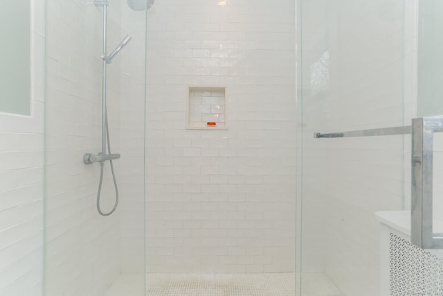 full bathroom featuring a shower stall