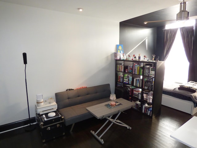 living room with dark hardwood / wood-style floors