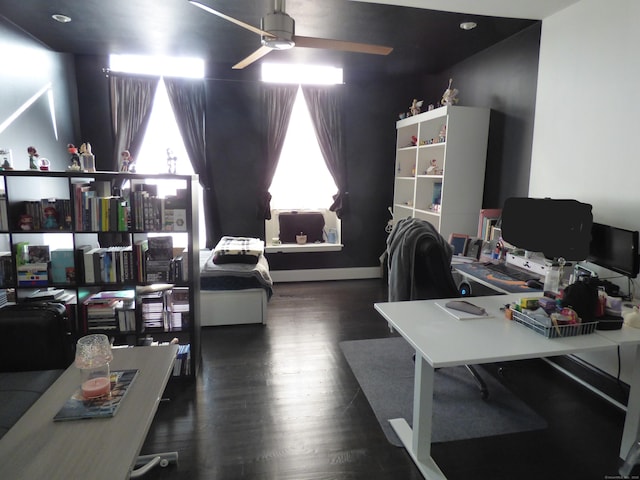 office space featuring dark wood-type flooring and ceiling fan