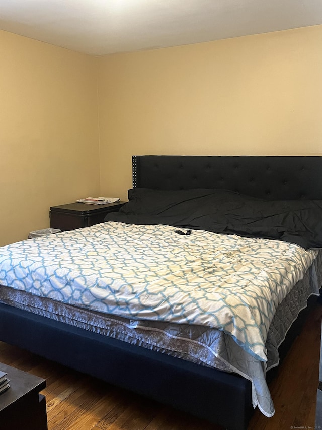 bedroom featuring wood-type flooring