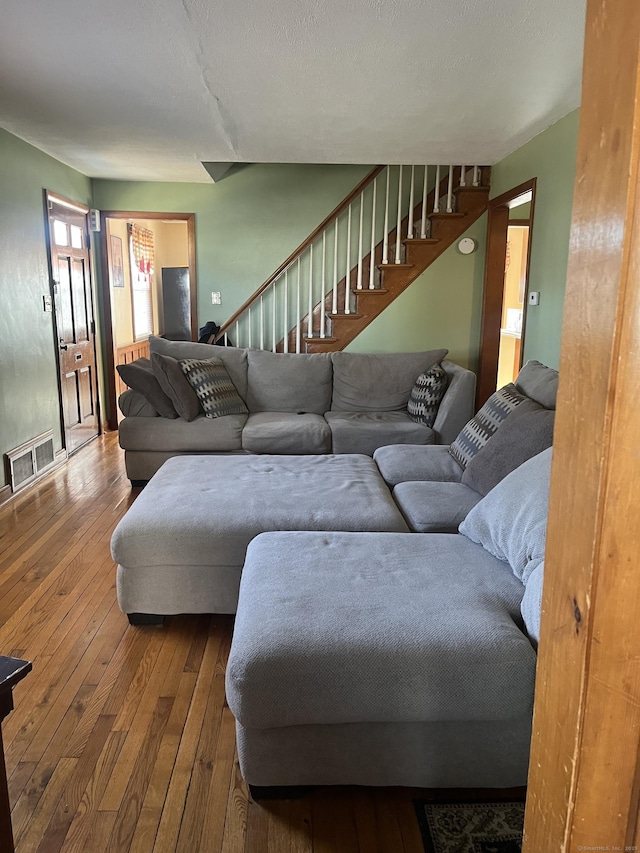 living room with hardwood / wood-style flooring