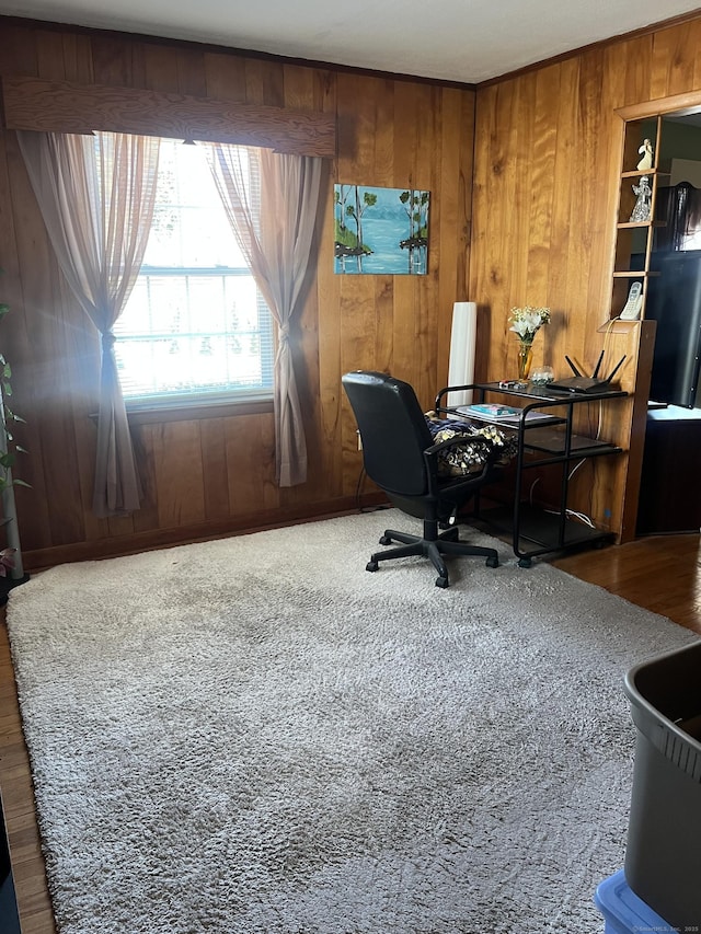 office space featuring wood walls