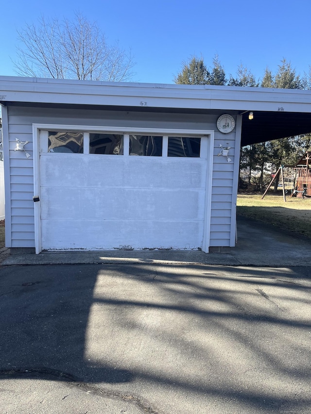 garage with a carport