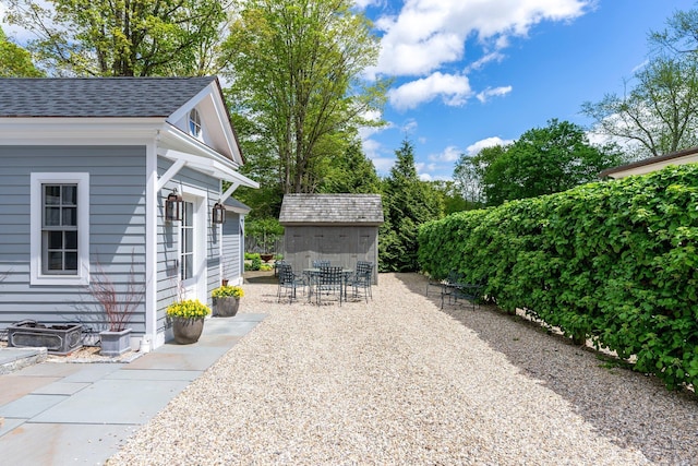 4 Main St, Salisbury, CT 06068 - view of patio / terrace with outdoor dining space and a storage unit