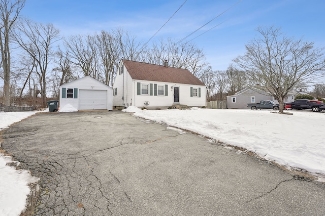 view of front of home with an outbuilding and a garage