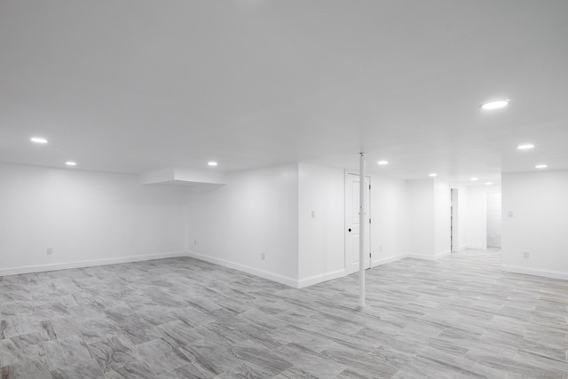 basement featuring light wood-type flooring