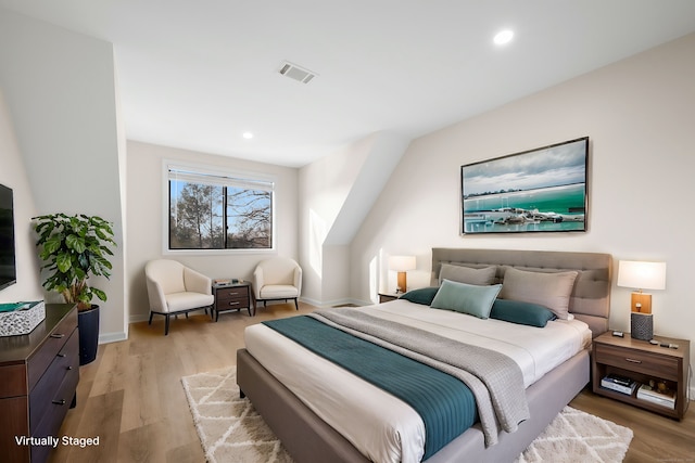 bedroom featuring light hardwood / wood-style floors