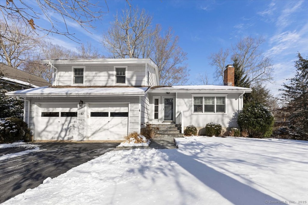 view of front of property featuring a garage