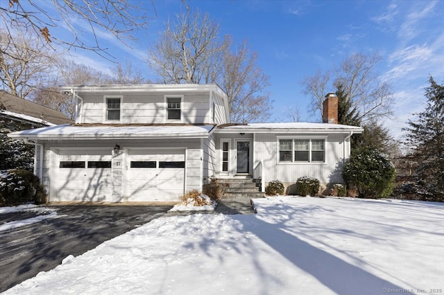 view of front of property featuring a garage