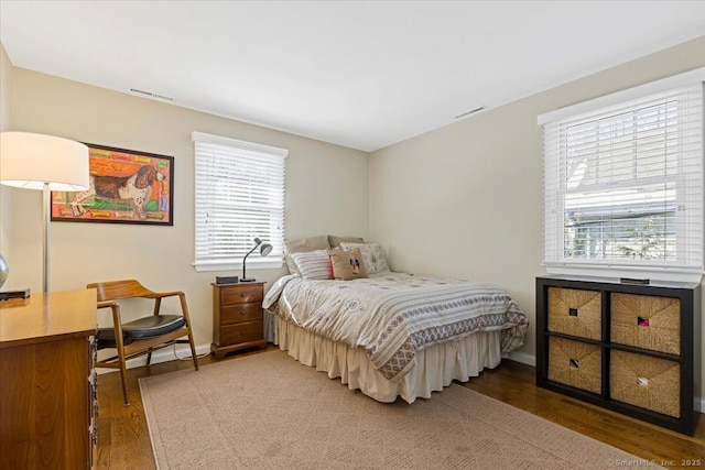 bedroom featuring hardwood / wood-style flooring