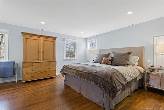 bedroom featuring dark hardwood / wood-style floors