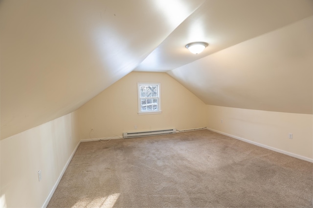 bonus room featuring a baseboard radiator, vaulted ceiling, and light colored carpet