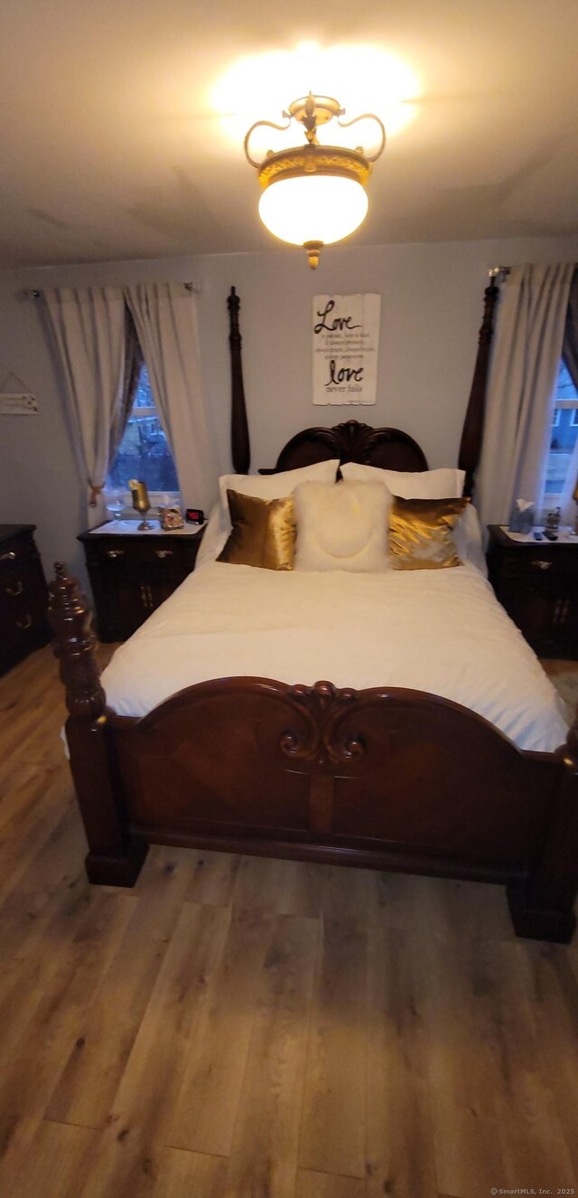 bedroom featuring hardwood / wood-style flooring