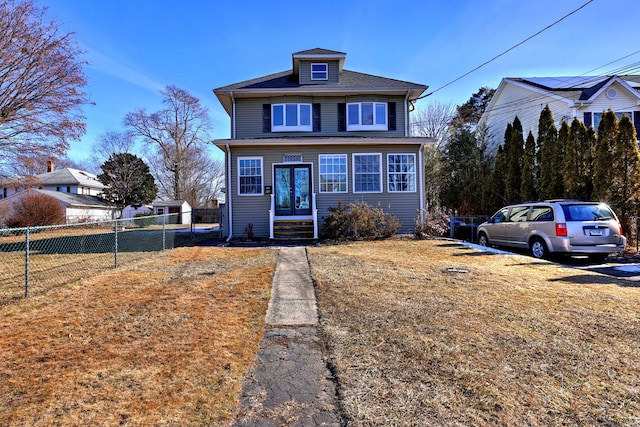 front facade featuring a front lawn