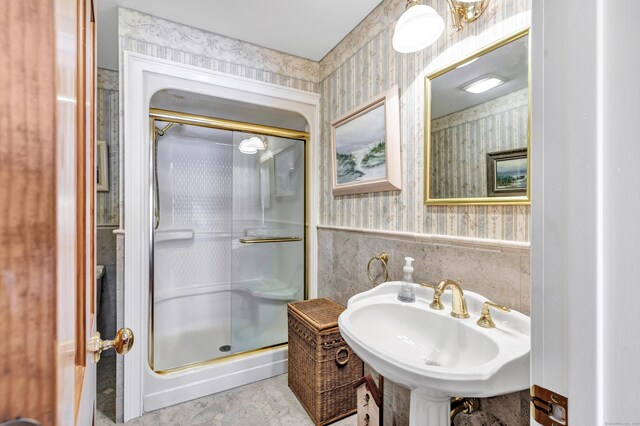 24 Brierwood Dr, Orange, CT 06477 - bathroom featuring wallpapered walls, a stall shower, and a sink