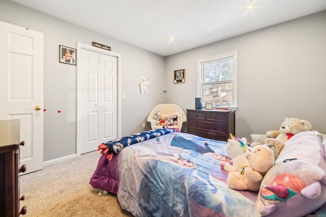 bedroom featuring light carpet