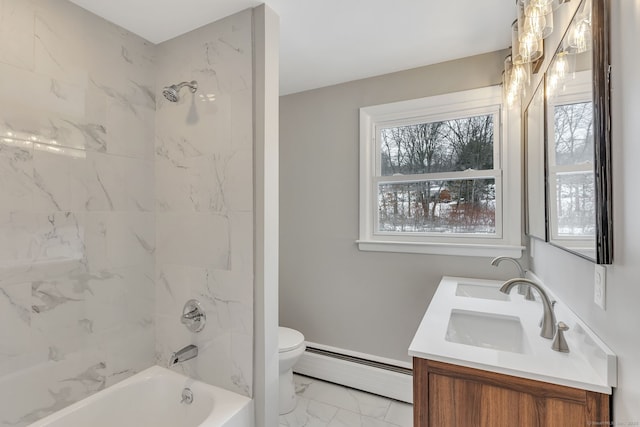 full bathroom featuring a baseboard radiator, toilet, vanity, and tiled shower / bath