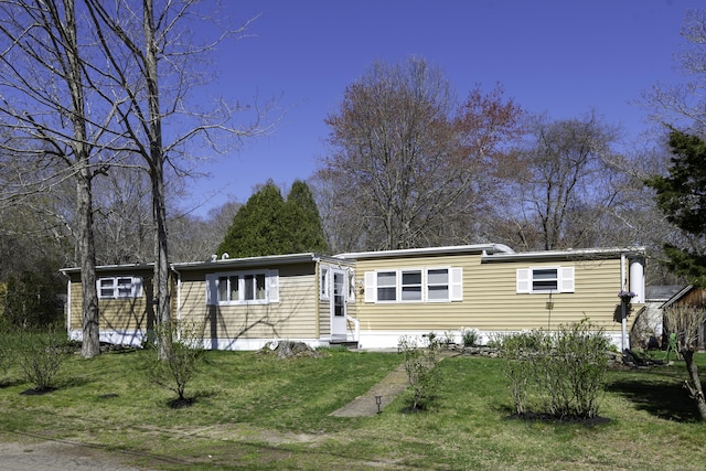 view of front of house with a front lawn