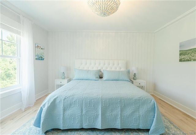 bedroom with light hardwood / wood-style floors