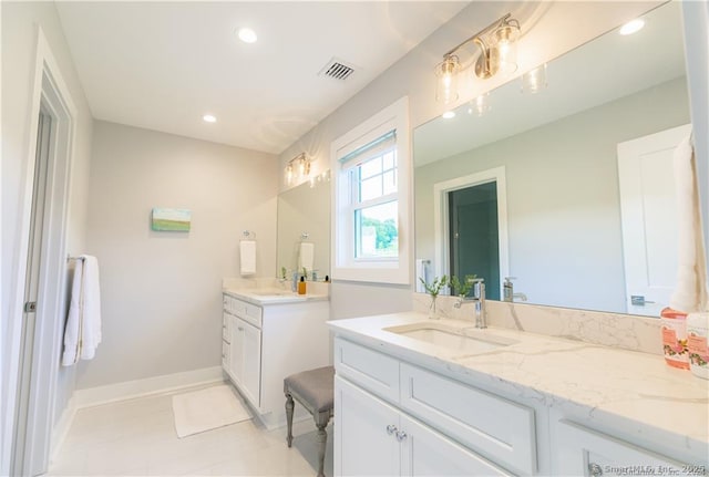 bathroom featuring vanity and tile patterned flooring