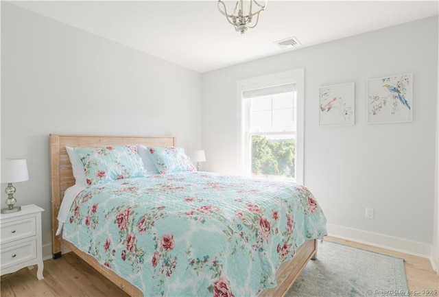 bedroom featuring light hardwood / wood-style flooring