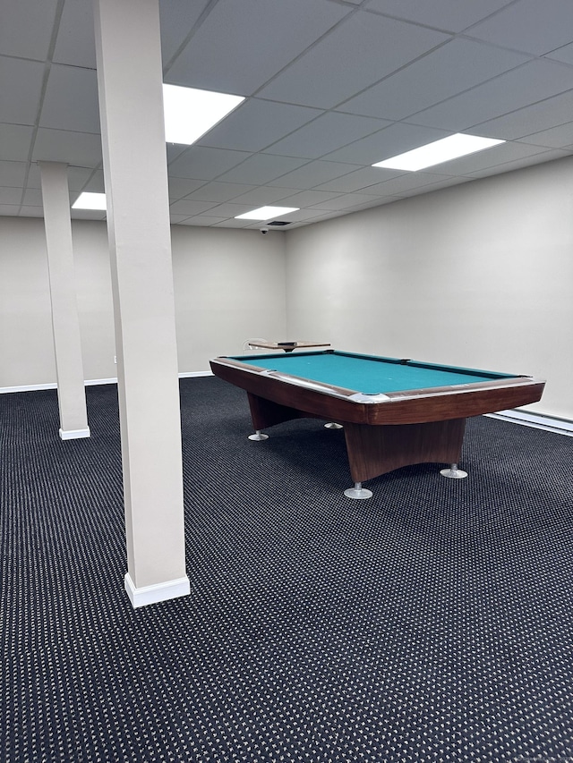 game room with dark colored carpet, pool table, and a drop ceiling