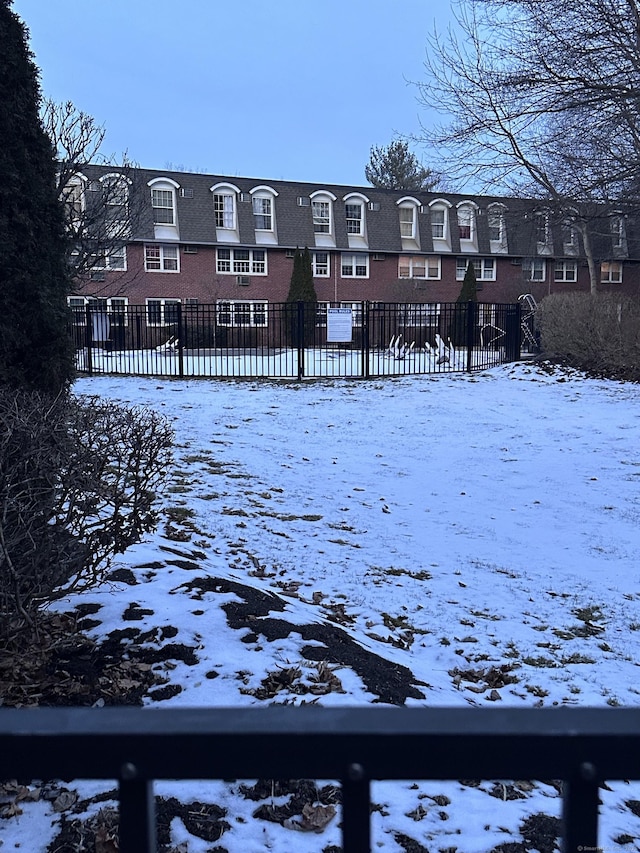 view of snow covered property