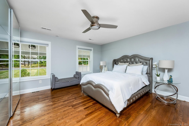 bedroom featuring wood-type flooring and ceiling fan