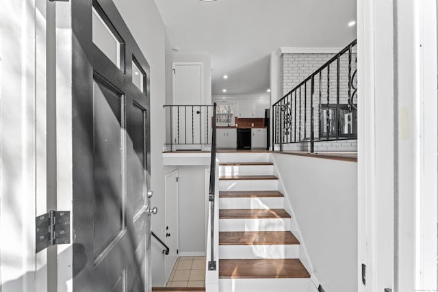 staircase with tile patterned flooring