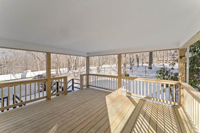 view of snow covered deck