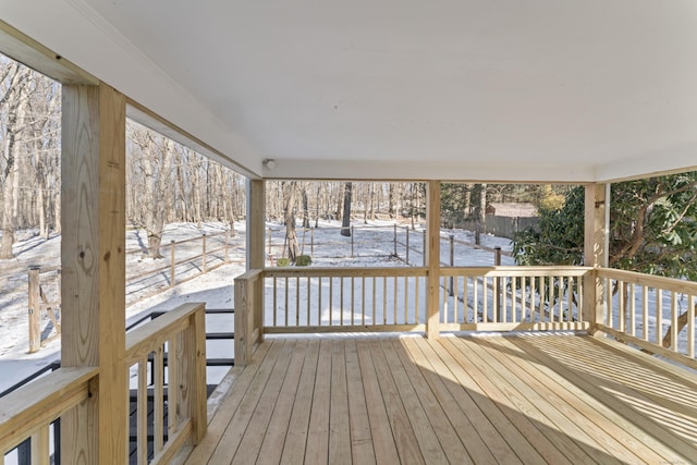 view of snow covered deck