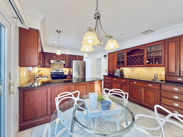 kitchen with appliances with stainless steel finishes, sink, decorative backsplash, hanging light fixtures, and crown molding