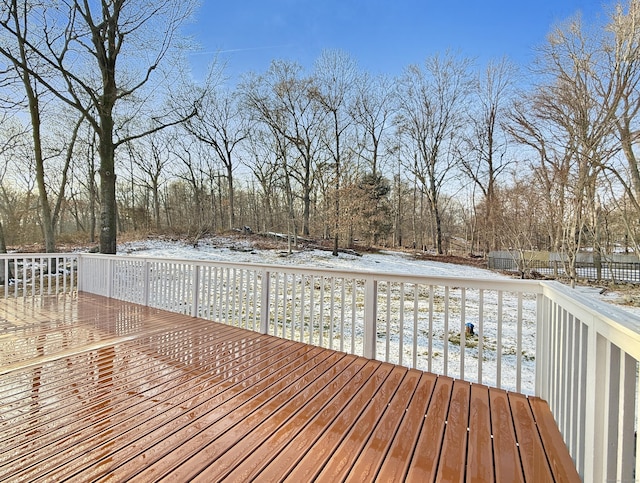 view of snow covered deck