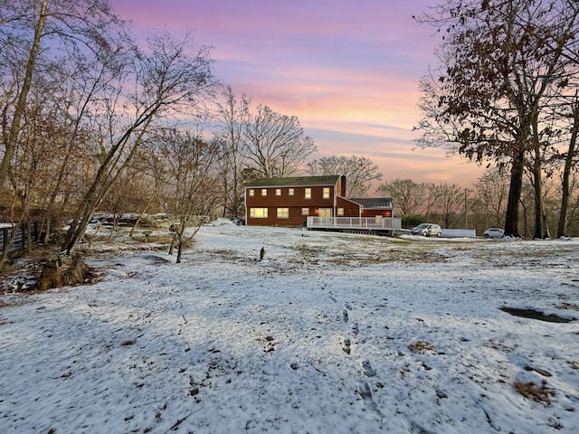 view of yard layered in snow