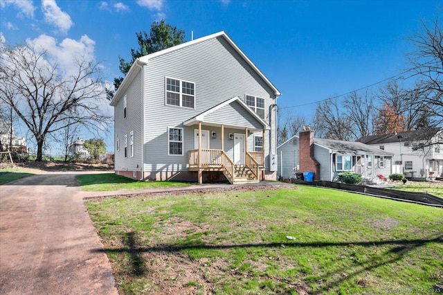 view of front of home with a front lawn