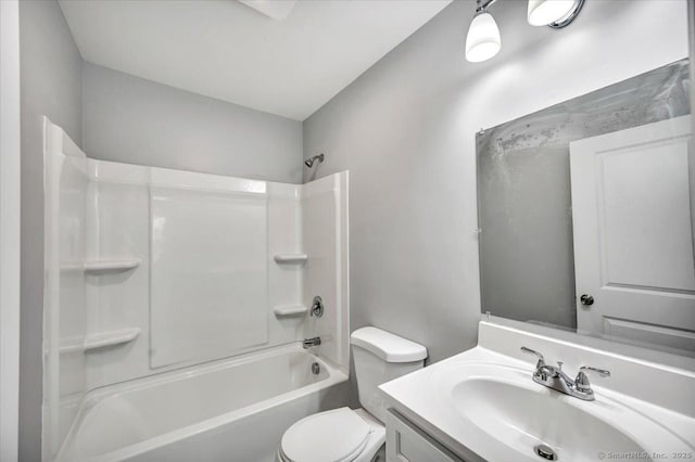 full bathroom featuring vanity, toilet, and shower / tub combination