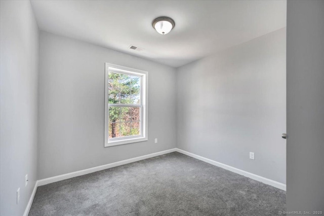 unfurnished room with carpet floors