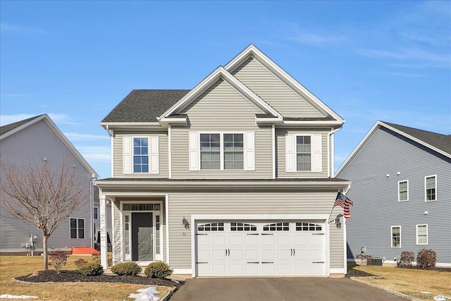 front of property featuring a garage