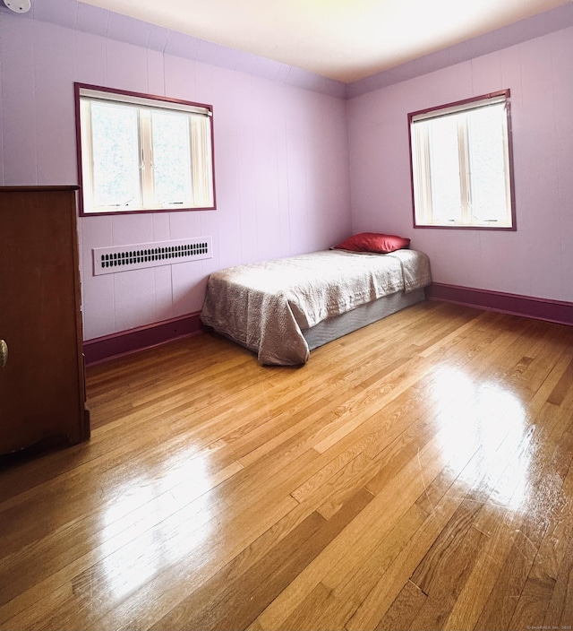 unfurnished bedroom featuring hardwood / wood-style floors